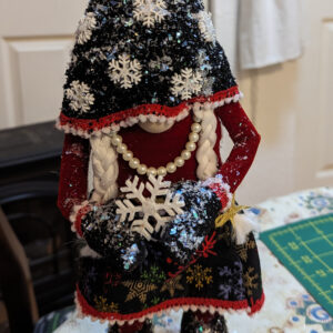 Christmas - Girl in snow with black mittens
